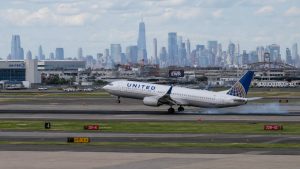 United Airlines Flight 169 clips light pole and truck near Newark during approach